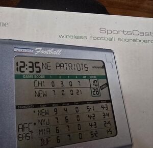 Brookstone SportsCast Wireless Football Scoreboard NFL Score Tracker, New!